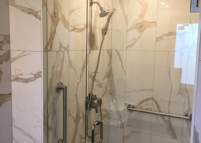 standing shower marble tile