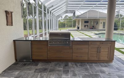 Sleek Outdoor Kitchen With Custom Cabinetry and Grill Enhances Backyard Living in Melbourne, FL