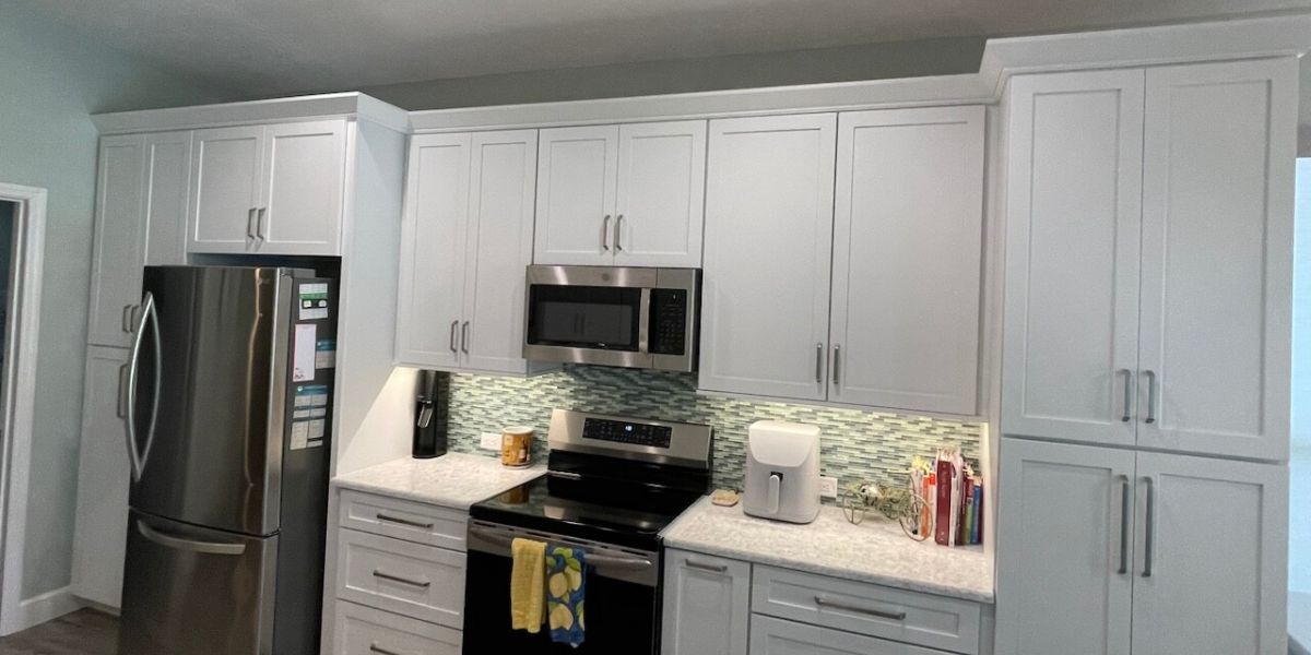 Side-by-side comparison of framed and frameless kitchen cabinets highlighting differences in construction, storage space, and design style